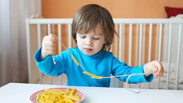 Preschooler maths activity with macaroni