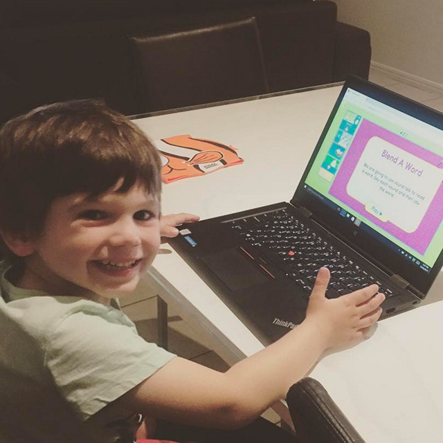 Child using Reading Eggs on a laptop